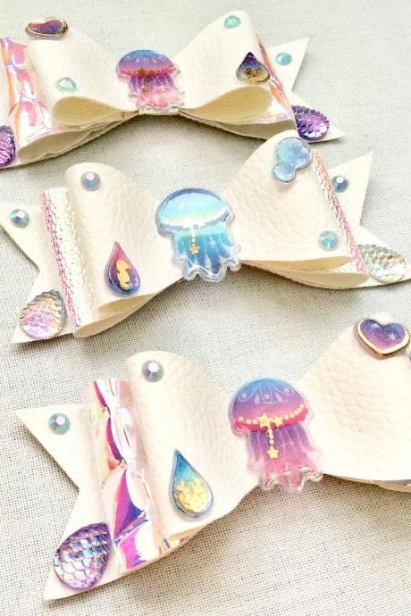 Mermaid holo hair bow cabochon resin white purple blue pink fairykei pastelgoth maritime sea galaxy scales jelkyfish kawaii brooch pin